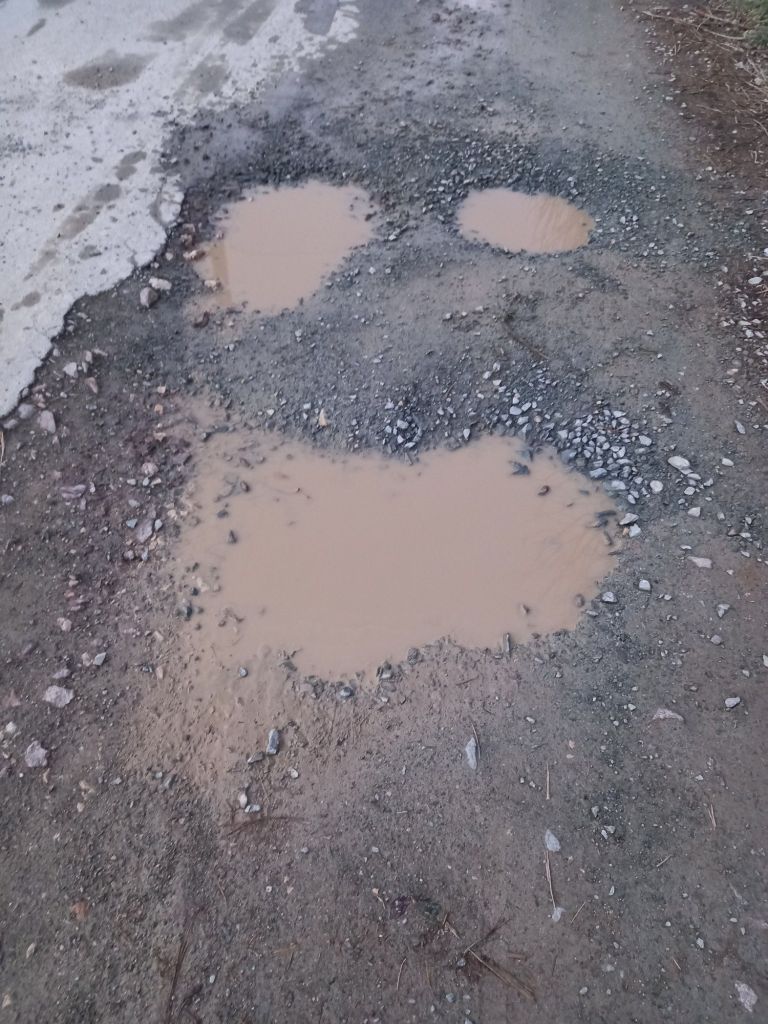 Pothole that looks like a face